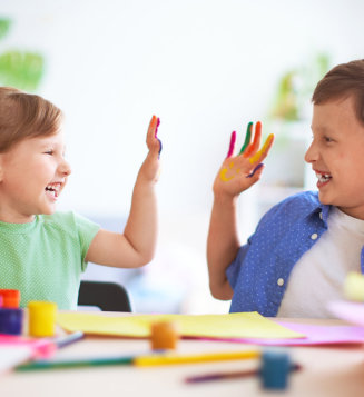 funny kids show their palms the painted paint
