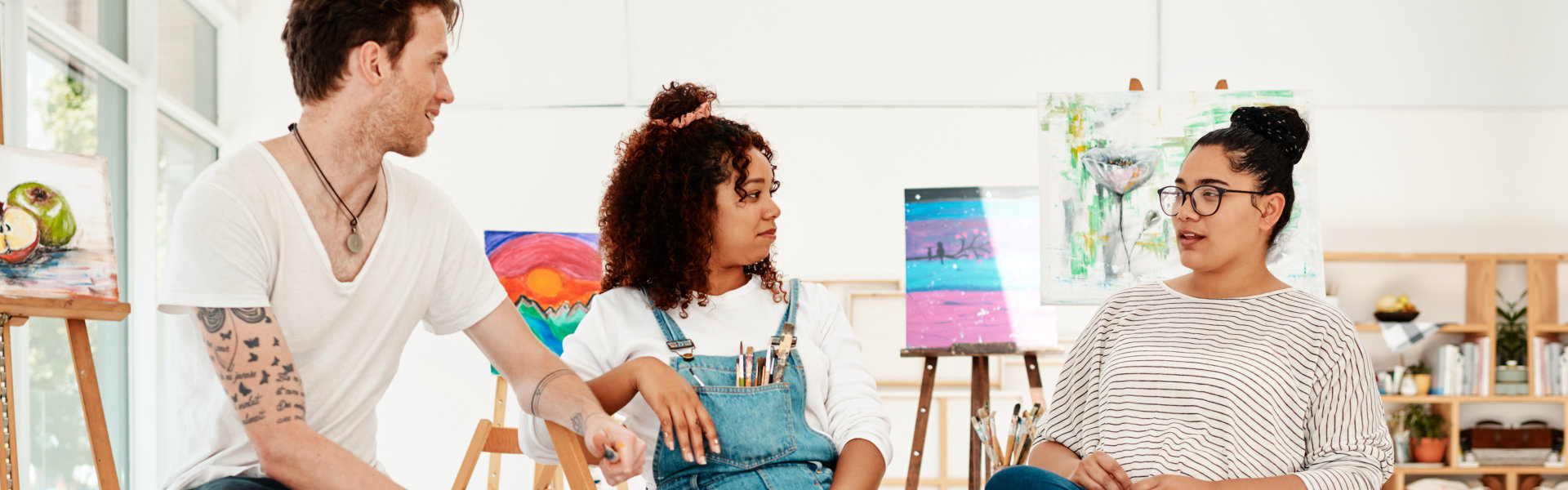 group of artists talking