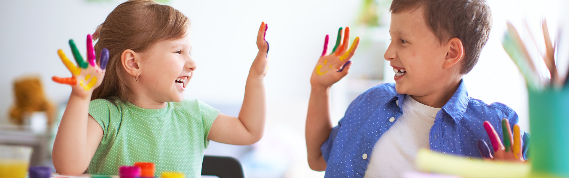 funny kids show their palms the painted paint
